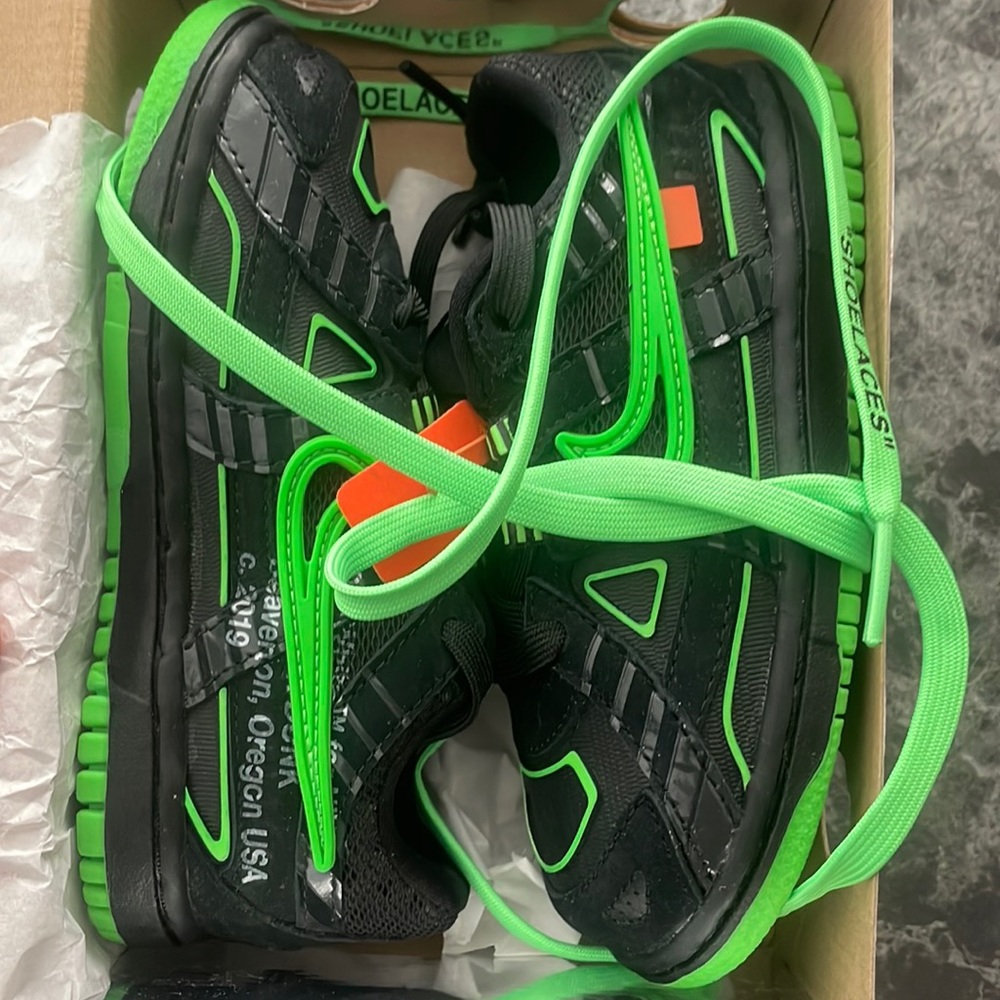 I am selling off white green and black dunks baby size!